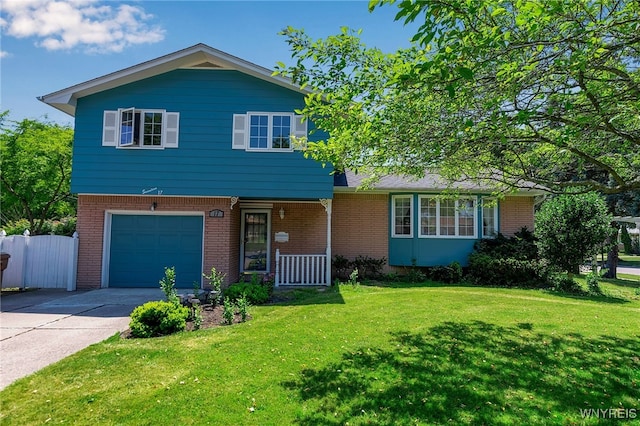 17 Frantzen Ter, Cheektowaga, NY 14227 - view of front facade with a garage, brick siding, concrete driveway, and a porch