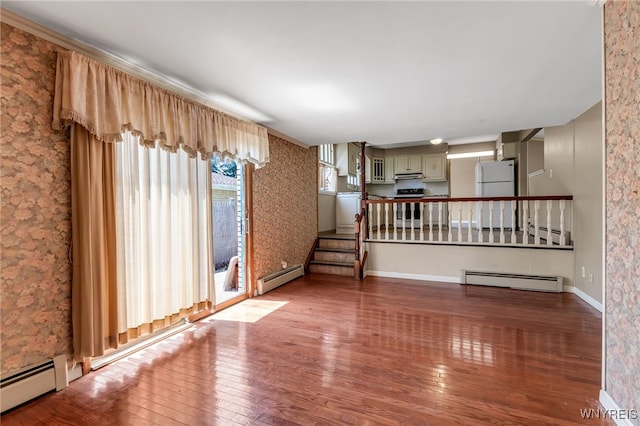 17 Frantzen Ter, Cheektowaga, NY 14227 - unfurnished living room with a baseboard radiator, wood finished floors, and stairs