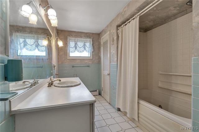 17 Frantzen Ter, Cheektowaga, NY 14227 - bathroom featuring shower / bathtub combination with curtain, vanity, tile walls, tile patterned floors, and a baseboard heating unit