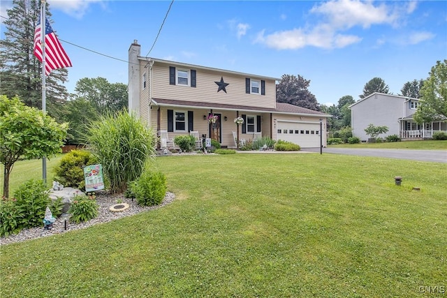 4956 Crestwood Ln, Onondaga, NY 13215 - traditional-style home featuring driveway, a chimney, an attached garage, covered porch, and a front lawn