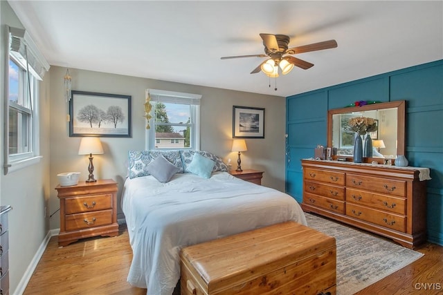 4956 Crestwood Ln, Onondaga, NY 13215 - bedroom featuring light wood-style floors and a ceiling fan