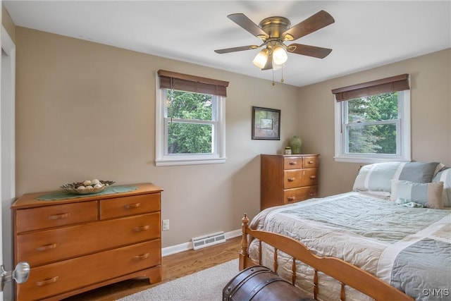 4956 Crestwood Ln, Onondaga, NY 13215 - bedroom featuring wood finished floors and a ceiling fan