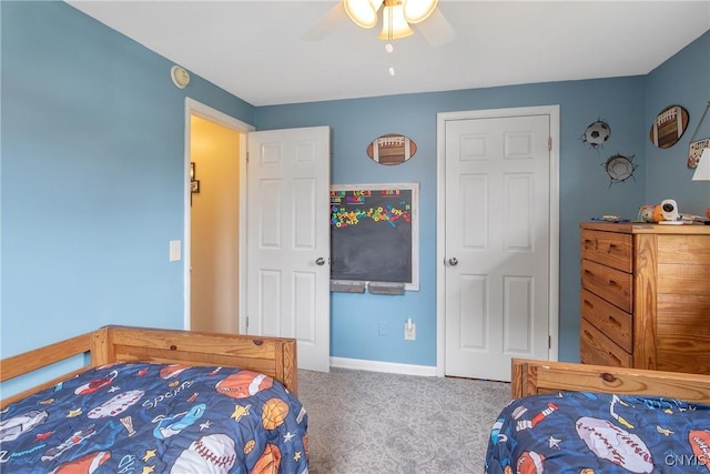 4956 Crestwood Ln, Onondaga, NY 13215 - carpeted bedroom with ceiling fan and baseboards