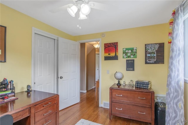 4956 Crestwood Ln, Onondaga, NY 13215 - office with a ceiling fan and wood finished floors