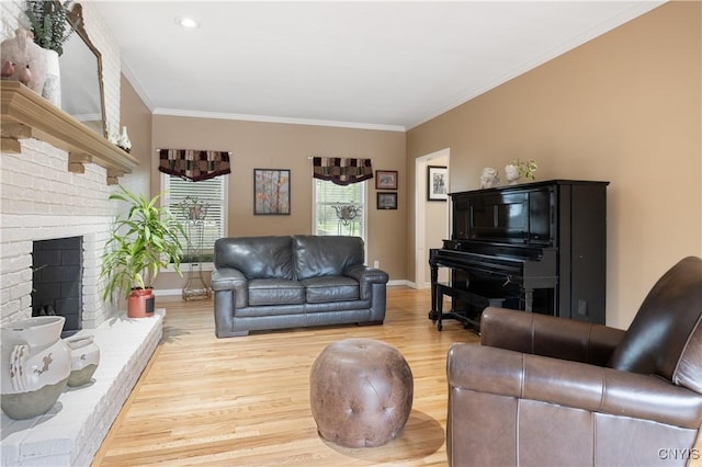 8067 Irish Mist Ln, Manlius, NY 13104 - living area featuring wood finished floors, ornamental molding, and a brick fireplace