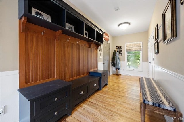 8067 Irish Mist Ln, Manlius, NY 13104 - mudroom featuring light wood finished floors and wainscoting