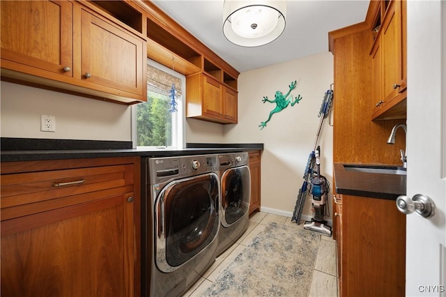 8067 Irish Mist Ln, Manlius, NY 13104 - laundry area featuring cabinet space, washer and clothes dryer, and light tile patterned floors