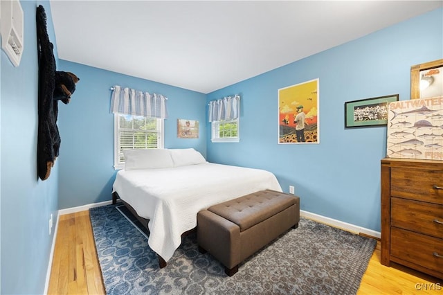8067 Irish Mist Ln, Manlius, NY 13104 - bedroom featuring wood finished floors