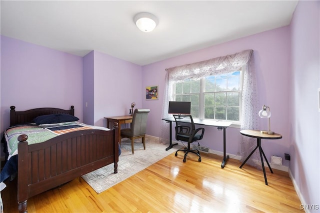 8067 Irish Mist Ln, Manlius, NY 13104 - bedroom featuring wood finished floors and a desk