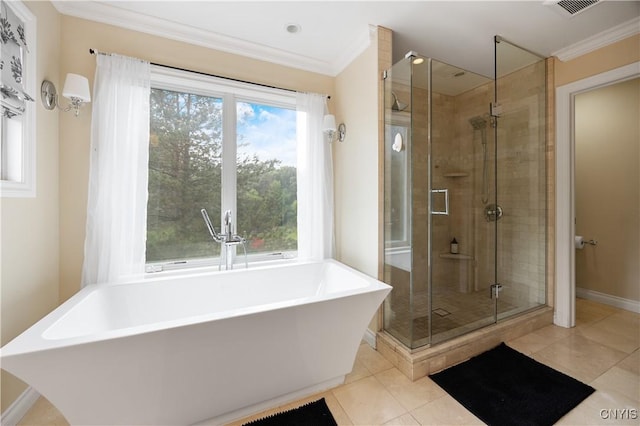 8067 Irish Mist Ln, Manlius, NY 13104 - bathroom featuring a freestanding tub, crown molding, a shower stall, and tile patterned flooring