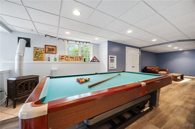 8067 Irish Mist Ln, Manlius, NY 13104 - playroom with a wood stove, wood finished floors, a paneled ceiling, billiards, and recessed lighting