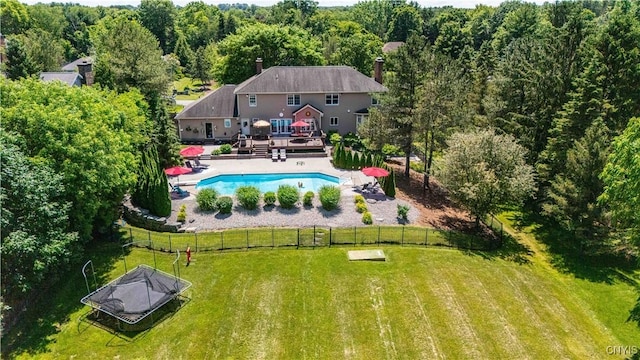 8067 Irish Mist Ln, Manlius, NY 13104 - view of swimming pool featuring a deck and a wooded view