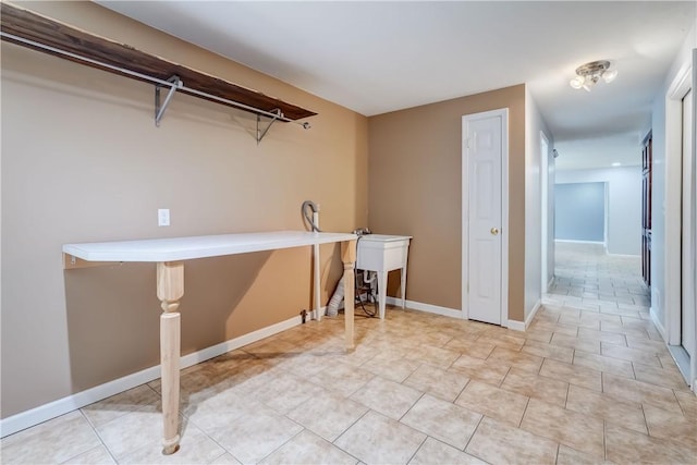 11 Hillcrest Dr, Hamlin, NY 14464 - laundry room with a sink and light tile patterned floors