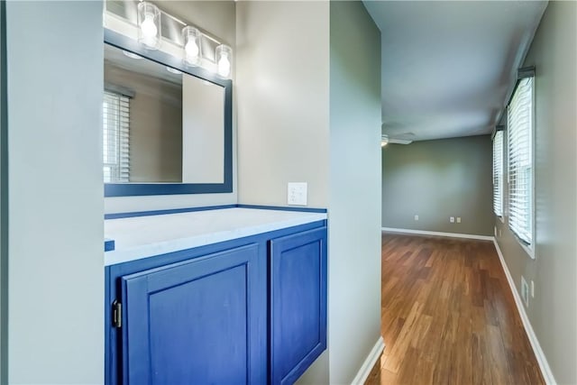11 Hillcrest Dr, Hamlin, NY 14464 - bathroom with wood finished floors and vanity