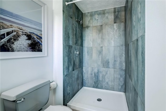 11 Hillcrest Dr, Hamlin, NY 14464 - bathroom with tiled shower and a textured ceiling