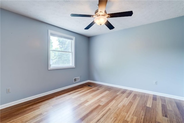 11 Hillcrest Dr, Hamlin, NY 14464 - unfurnished room featuring wood finished floors