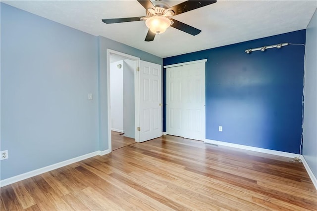 11 Hillcrest Dr, Hamlin, NY 14464 - unfurnished bedroom featuring light wood finished floors, a closet, and ceiling fan
