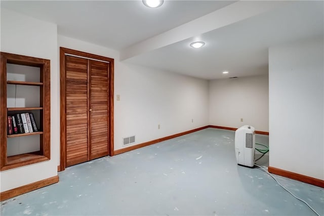 11 Hillcrest Dr, Hamlin, NY 14464 - unfurnished bedroom featuring finished concrete floors, recessed lighting, and a closet