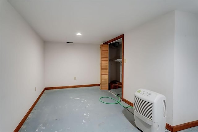 11 Hillcrest Dr, Hamlin, NY 14464 - unfurnished bedroom featuring concrete floors, recessed lighting, and a closet