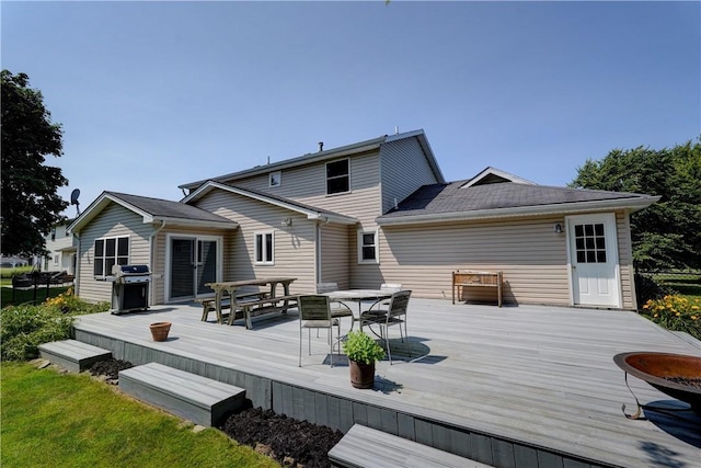 11 Hillcrest Dr, Hamlin, NY 14464 - back of house with outdoor dining area and a wooden deck