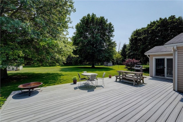 11 Hillcrest Dr, Hamlin, NY 14464 - wooden terrace featuring outdoor dining space, a lawn, and area for grilling