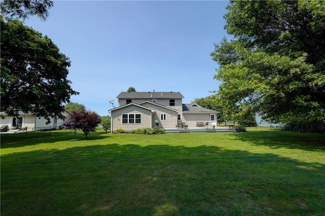 11 Hillcrest Dr, Hamlin, NY 14464 - back of property featuring a wooden deck