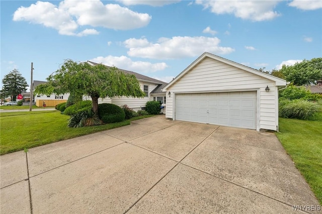 66 Gierlach St, Cheektowaga, NY 14212 - view of side of home featuring a yard, a garage, and an outbuilding