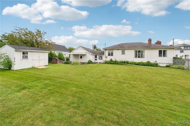 66 Gierlach St, Cheektowaga, NY 14212 - view of green lawn with a storage shed