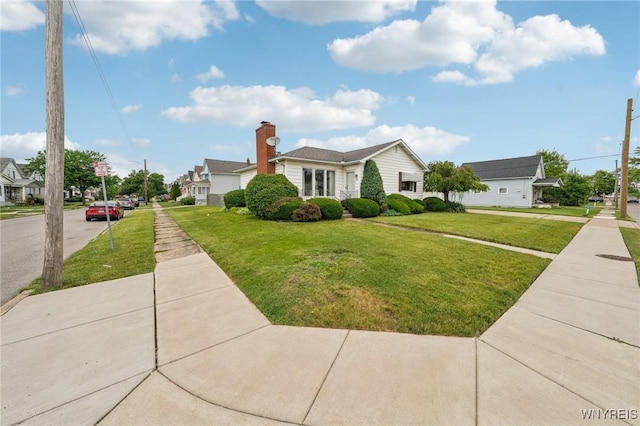 66 Gierlach St, Cheektowaga, NY 14212 - view of front of home with a front lawn and a residential view