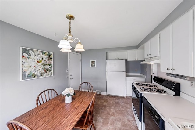 66 Gierlach St, Cheektowaga, NY 14212 - kitchen featuring white appliances, under cabinet range hood, light countertops, white cabinetry, and a chandelier