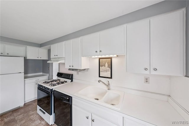 66 Gierlach St, Cheektowaga, NY 14212 - kitchen featuring freestanding refrigerator, dishwasher, gas stove, under cabinet range hood, and white cabinetry