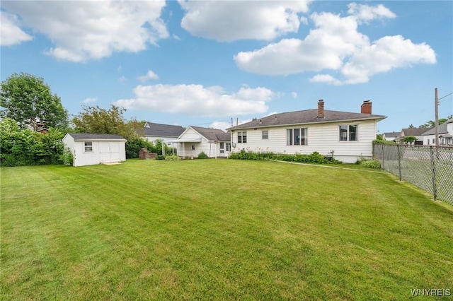 66 Gierlach St, Cheektowaga, NY 14212 - rear view of property featuring a chimney and a storage unit