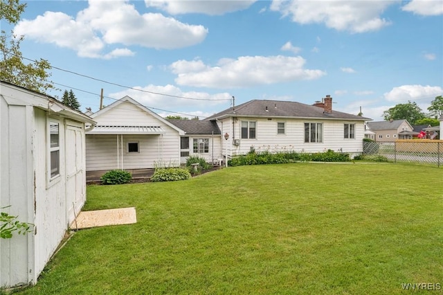 66 Gierlach St, Cheektowaga, NY 14212 - back of house with a chimney