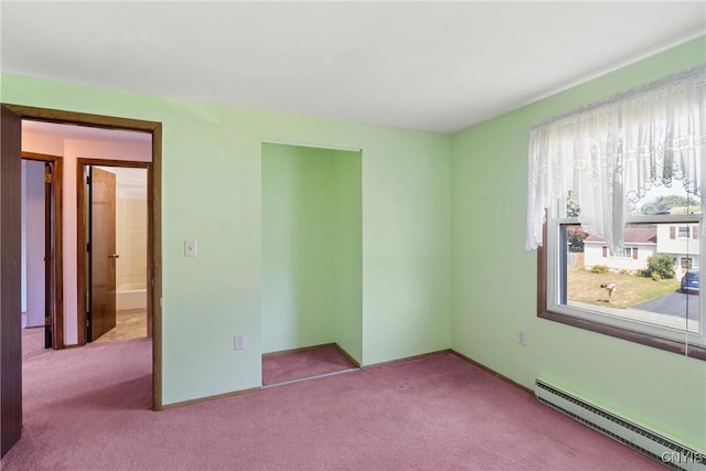 5539 Taormina Dr, Clay, NY 13041 - unfurnished bedroom featuring a baseboard radiator and carpet