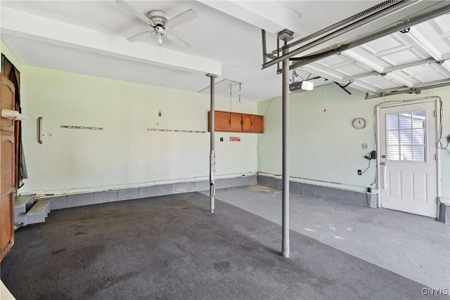 5539 Taormina Dr, Clay, NY 13041 - garage featuring a garage door opener and a ceiling fan