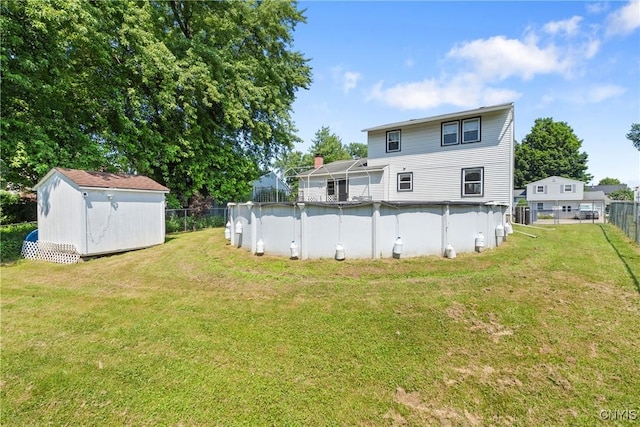 5539 Taormina Dr, Clay, NY 13041 - back of property featuring a storage unit and an outdoor pool