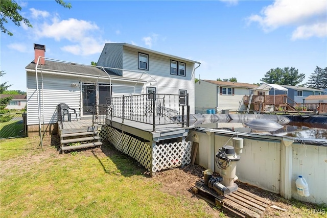 5539 Taormina Dr, Clay, NY 13041 - back of property featuring a deck, a chimney, and a residential view