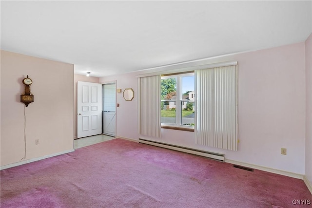 5539 Taormina Dr, Clay, NY 13041 - empty room featuring a baseboard heating unit and carpet