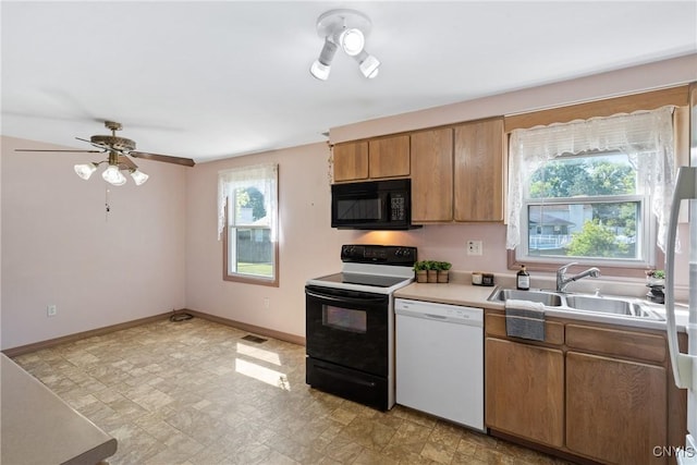5539 Taormina Dr, Clay, NY 13041 - kitchen featuring black microwave, range with electric stovetop, dishwasher, light countertops, and ceiling fan