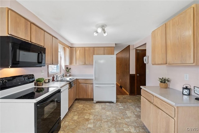 5539 Taormina Dr, Clay, NY 13041 - kitchen with white appliances, light countertops, stone finish flooring, and light brown cabinetry