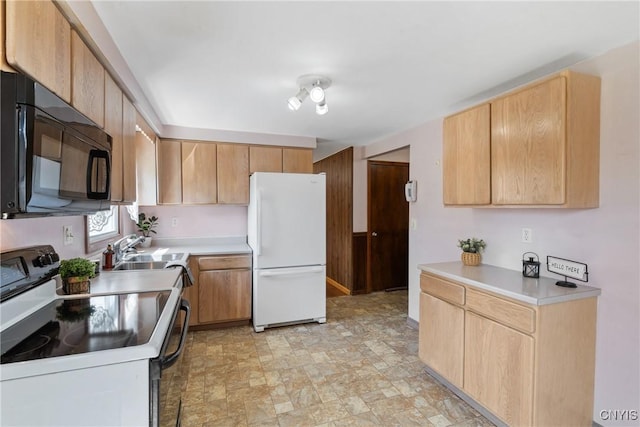 5539 Taormina Dr, Clay, NY 13041 - kitchen with black microwave, range with electric stovetop, freestanding refrigerator, and light countertops