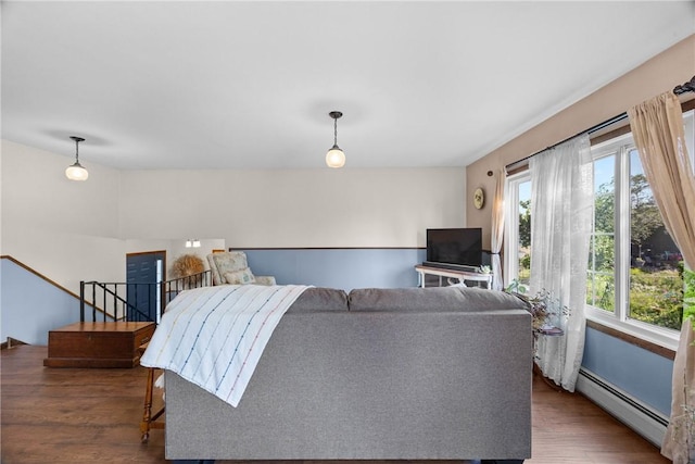 7980 Cedarwood Dr, Rome, NY 13440 - living area featuring a baseboard radiator and wood finished floors