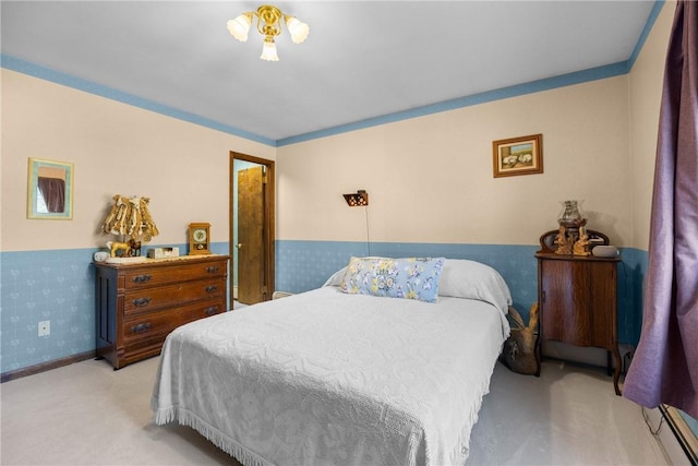 7980 Cedarwood Dr, Rome, NY 13440 - carpeted bedroom with a wainscoted wall and a baseboard radiator