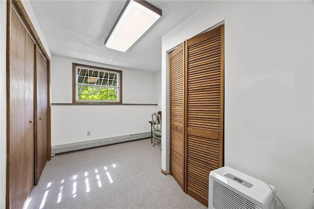 7980 Cedarwood Dr, Rome, NY 13440 - hall featuring a baseboard radiator and carpet floors