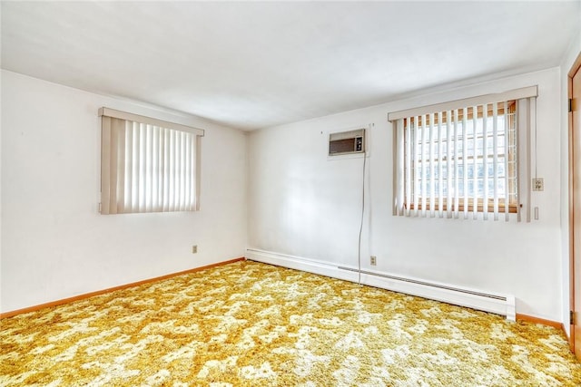 163 Auramar Dr, Irondequoit, NY 14609 - empty room with baseboard heating, carpet, and an AC wall unit