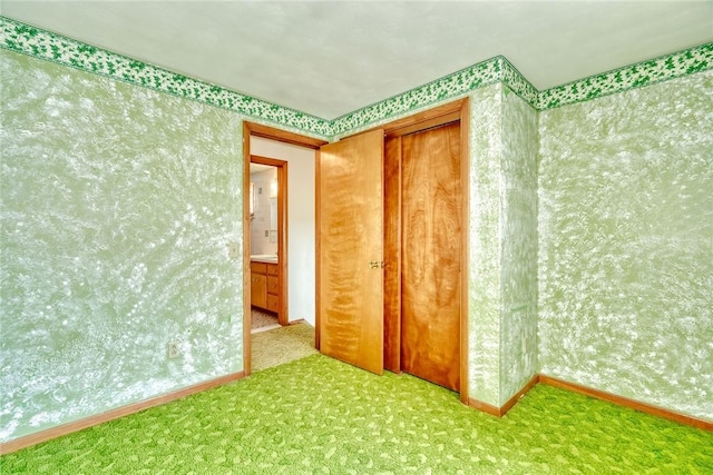 163 Auramar Dr, Irondequoit, NY 14609 - empty room featuring carpet flooring and wallpapered walls