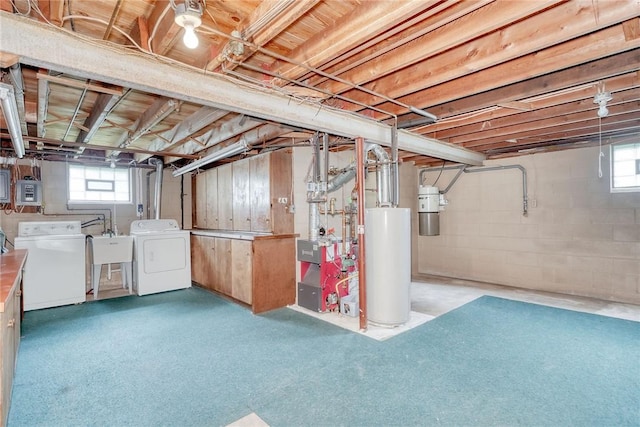 163 Auramar Dr, Irondequoit, NY 14609 - basement featuring washer and clothes dryer, gas water heater, and healthy amount of natural light