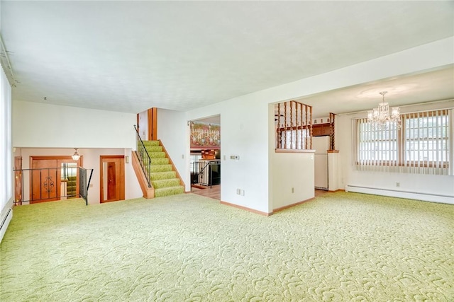 163 Auramar Dr, Irondequoit, NY 14609 - unfurnished living room with baseboard heating, a chandelier, carpet flooring, and stairs