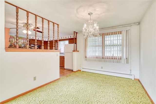 163 Auramar Dr, Irondequoit, NY 14609 - unfurnished room with a baseboard heating unit, a chandelier, and light colored carpet