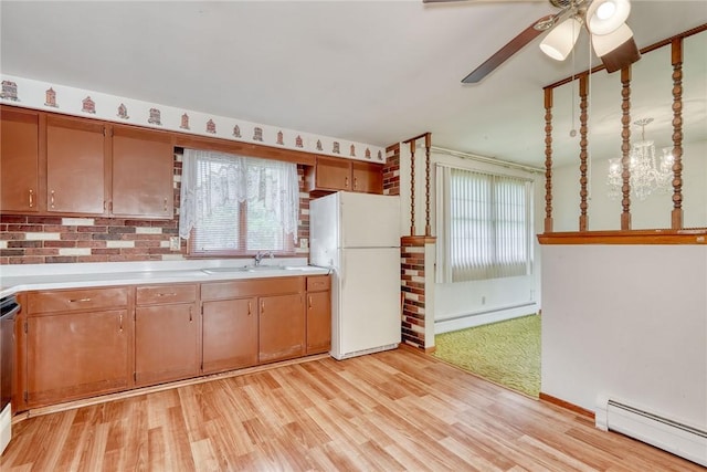 163 Auramar Dr, Irondequoit, NY 14609 - kitchen with freestanding refrigerator, baseboard heating, a baseboard radiator, light countertops, and ceiling fan